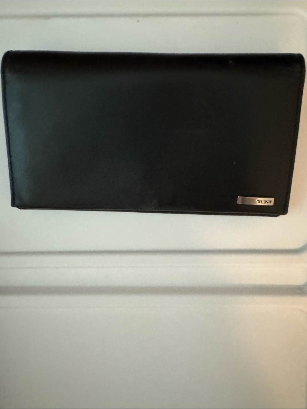 Tumi Black Leather Long Wallet with Metal Logo Plaque